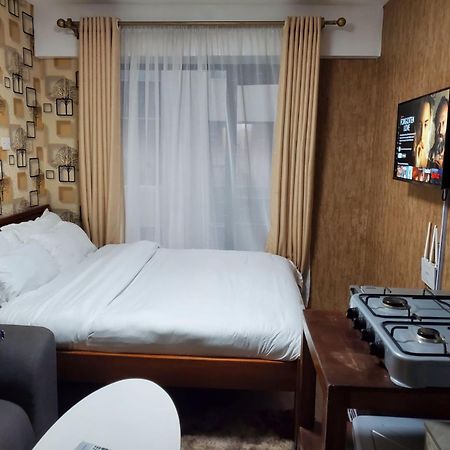 Lovely & Cozy Compact Studio Near Airport With Rooftop View Apartment Nairobi Bagian luar foto