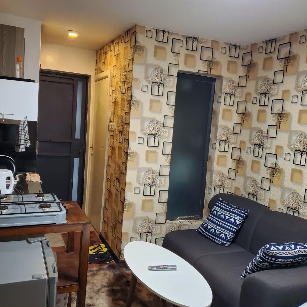 Lovely & Cozy Compact Studio Near Airport With Rooftop View Apartment Nairobi Bagian luar foto