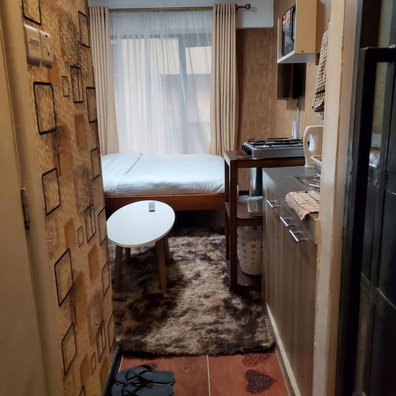 Lovely & Cozy Compact Studio Near Airport With Rooftop View Apartment Nairobi Bagian luar foto