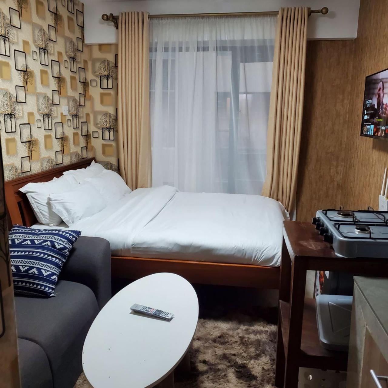 Lovely & Cozy Compact Studio Near Airport With Rooftop View Apartment Nairobi Bagian luar foto