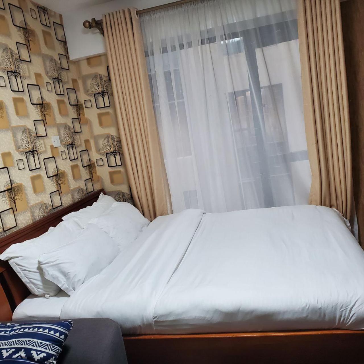 Lovely & Cozy Compact Studio Near Airport With Rooftop View Apartment Nairobi Bagian luar foto