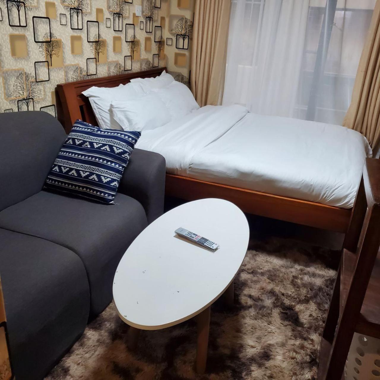 Lovely & Cozy Compact Studio Near Airport With Rooftop View Apartment Nairobi Bagian luar foto