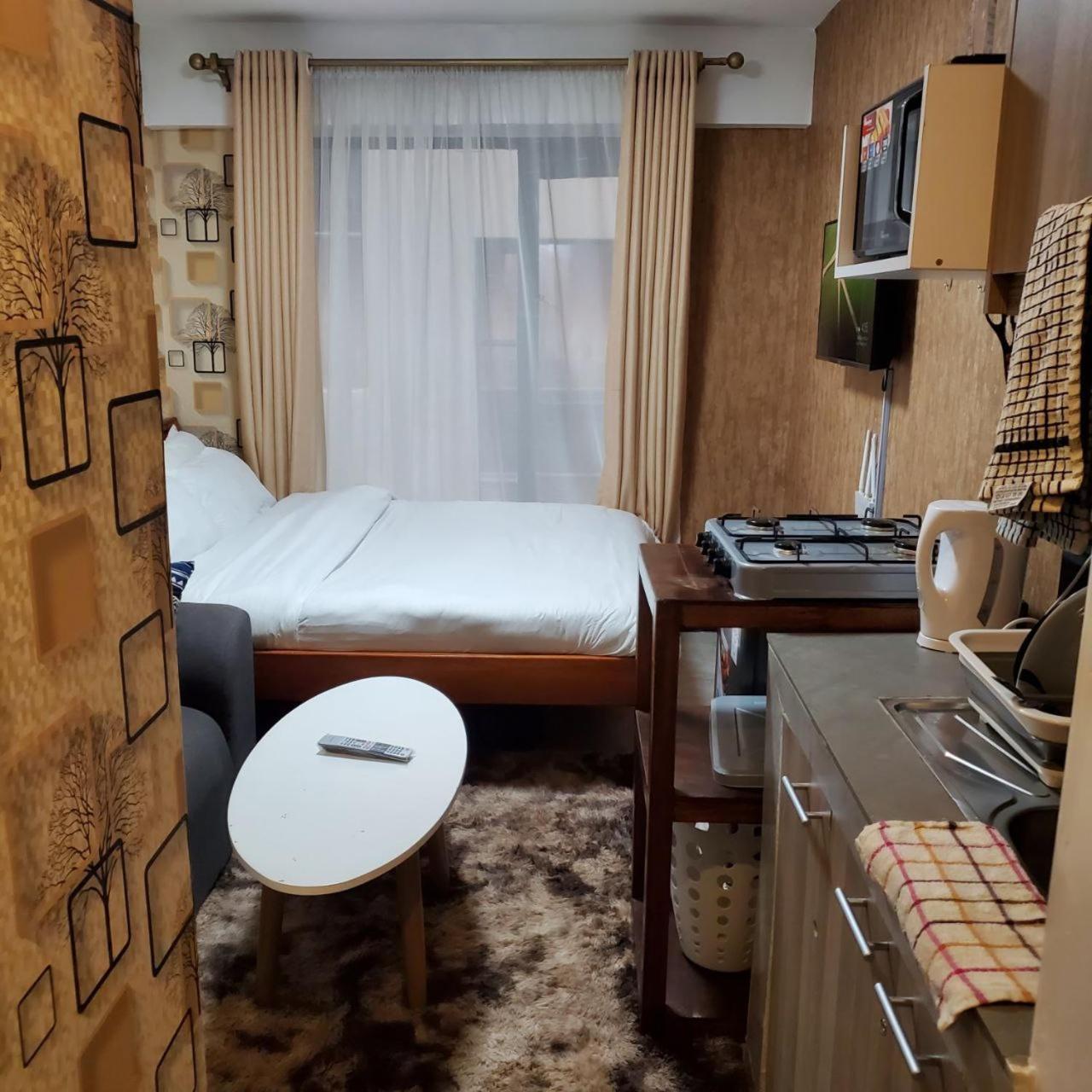 Lovely & Cozy Compact Studio Near Airport With Rooftop View Apartment Nairobi Bagian luar foto